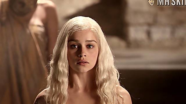 Taking a hot bath blonde babe Emilia Clarke exposes her lovely juicy booty