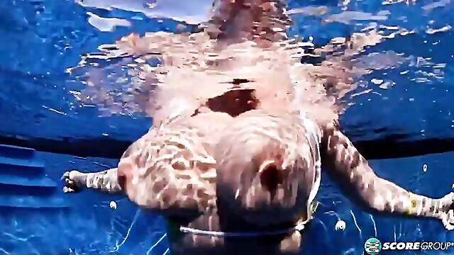 Lovely doll with huge boobs Lana Ivans undressed underwater