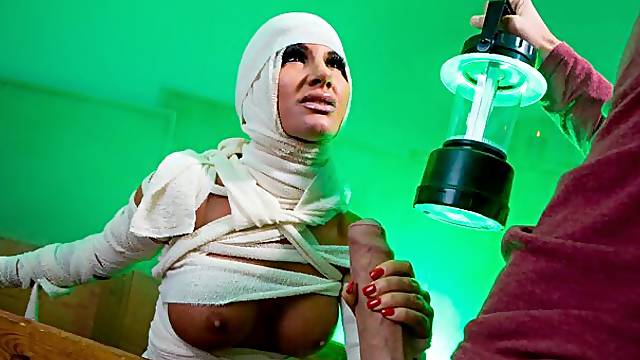 Cute-looking busty MILF Elicia Solis is getting fucked from behind