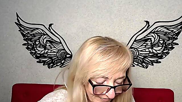 Blonde amateur MILF with glasses