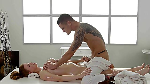 Steamy redhead is set for more than just erotic massage