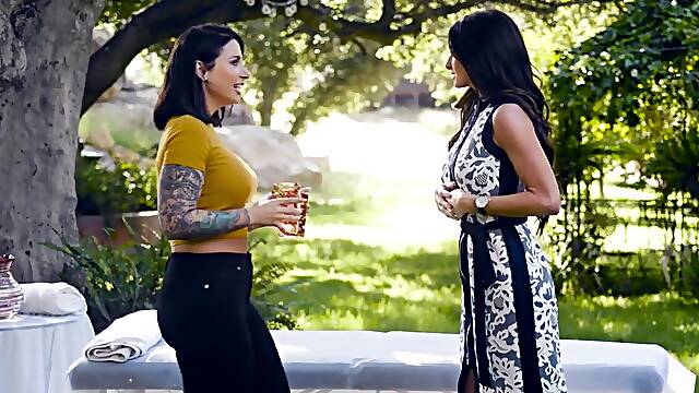 Outdoor action with two equally kinky brunette babes