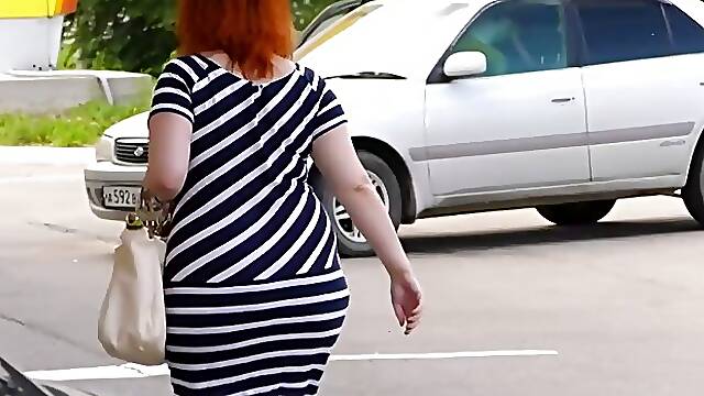 Katrin Porto is a red haired woman who likes sex in the back of a car