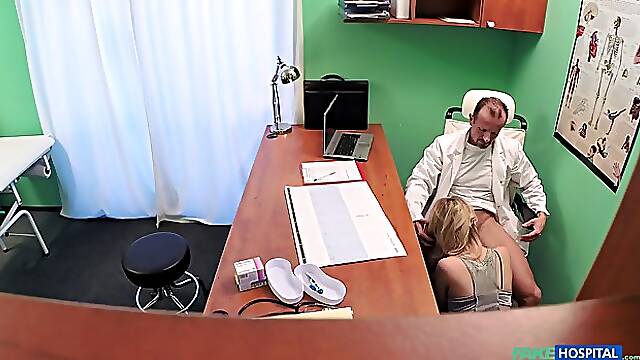 Busty blonde Karina Grand seduces doctor at the hospital