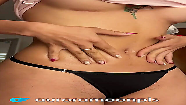 Colombian MILF strips and slathers lotion on her sexy body