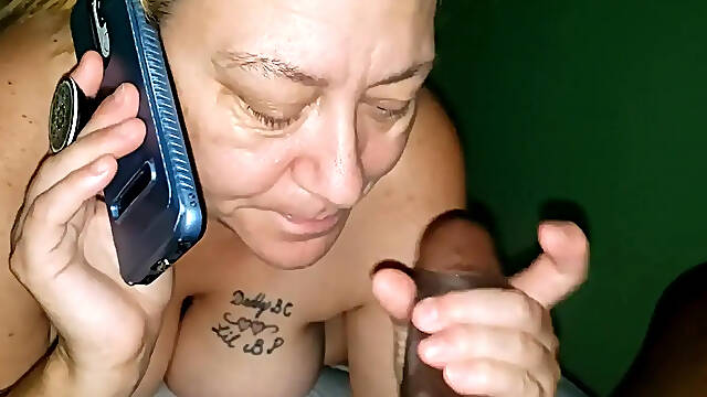 Cheating MILF screws neighbor while talking to her boyfriend on the phone