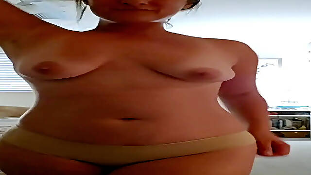 Curvy big ass MILF strips and teases