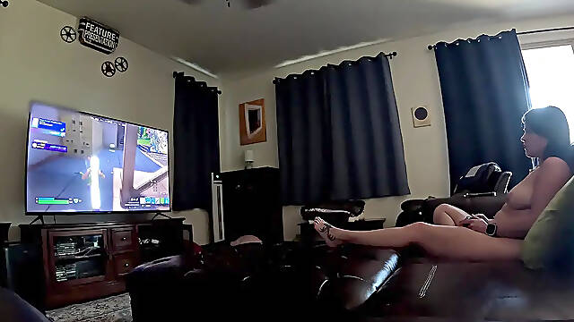 Gamer girl with big tits smokes 420 and shows her feet in Fortnite
