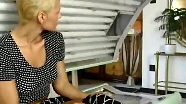 Busty short-haired blond milf enjoys sex in a solarium
