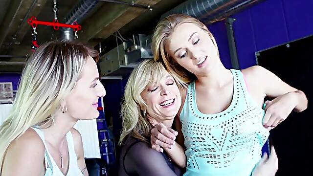 Body stocking babe Nina Hartley fucks two tasty lesbians