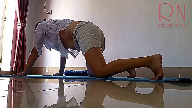 Regina Noir. A woman in white shorts practices yoga in the gym. A cutie out of pants is engaged in yoga. The slut ta