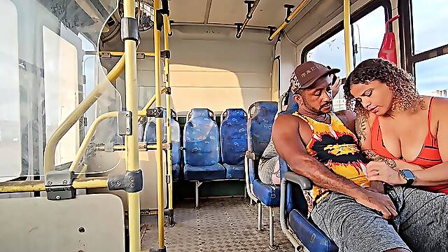 A shameless duo having orgy on the bus while a nymph passenger in the seat behind films it all.