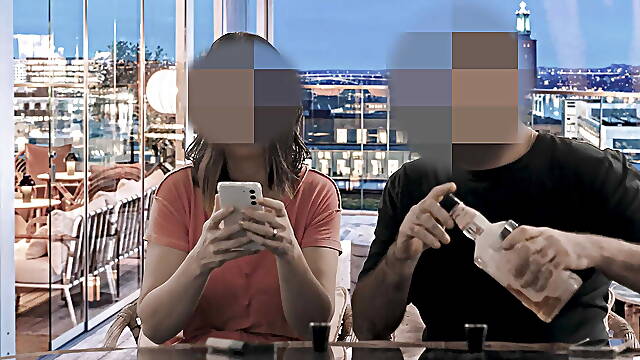 Blowjob on a friend at the bar table.