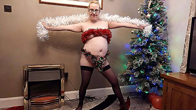 Dancing Striptease in Holdup Stockings and Tinsel for Christmas