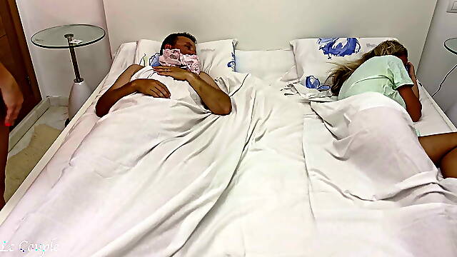 Wife woke up when she heard noises and saw that her husband is having sex with their girlfriend +...