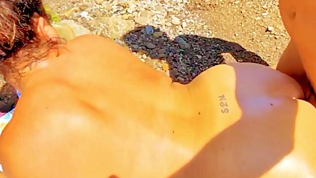 Cheating milf gets naked on quiet public beach and fucks and licks nuts on stranger