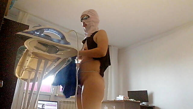 Sexy woman does naked cleaning. Brunette, hairy pussy, big ass, big tits. Sexy mom massages herself with a vibrator