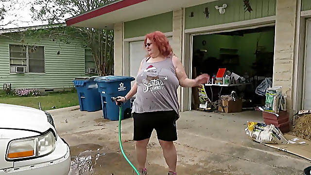 Sexy Mature bbw redhead Nurse Vicki washes her car!